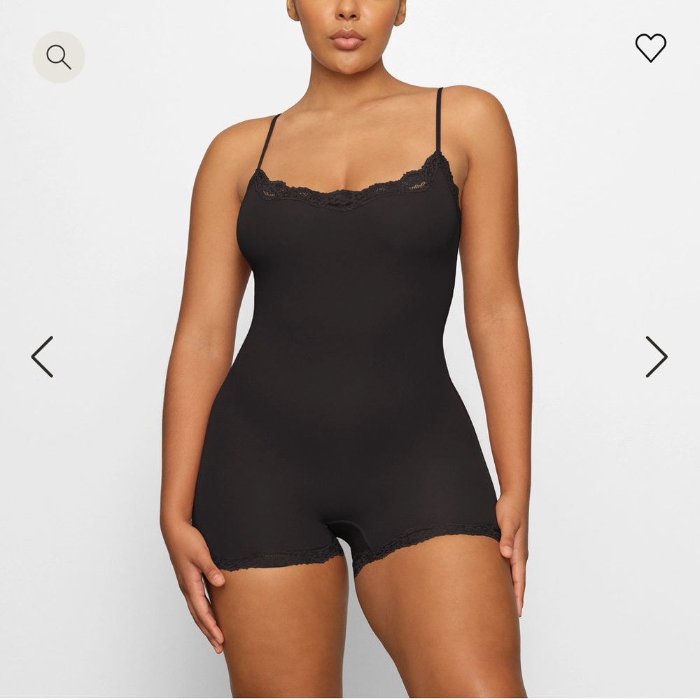 Fits everybody lace onesie